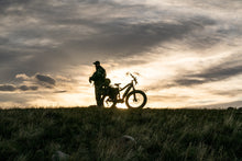 Load image into Gallery viewer, QuietKat Ranger Fat Tire Electric Mountain Bike on mountain
